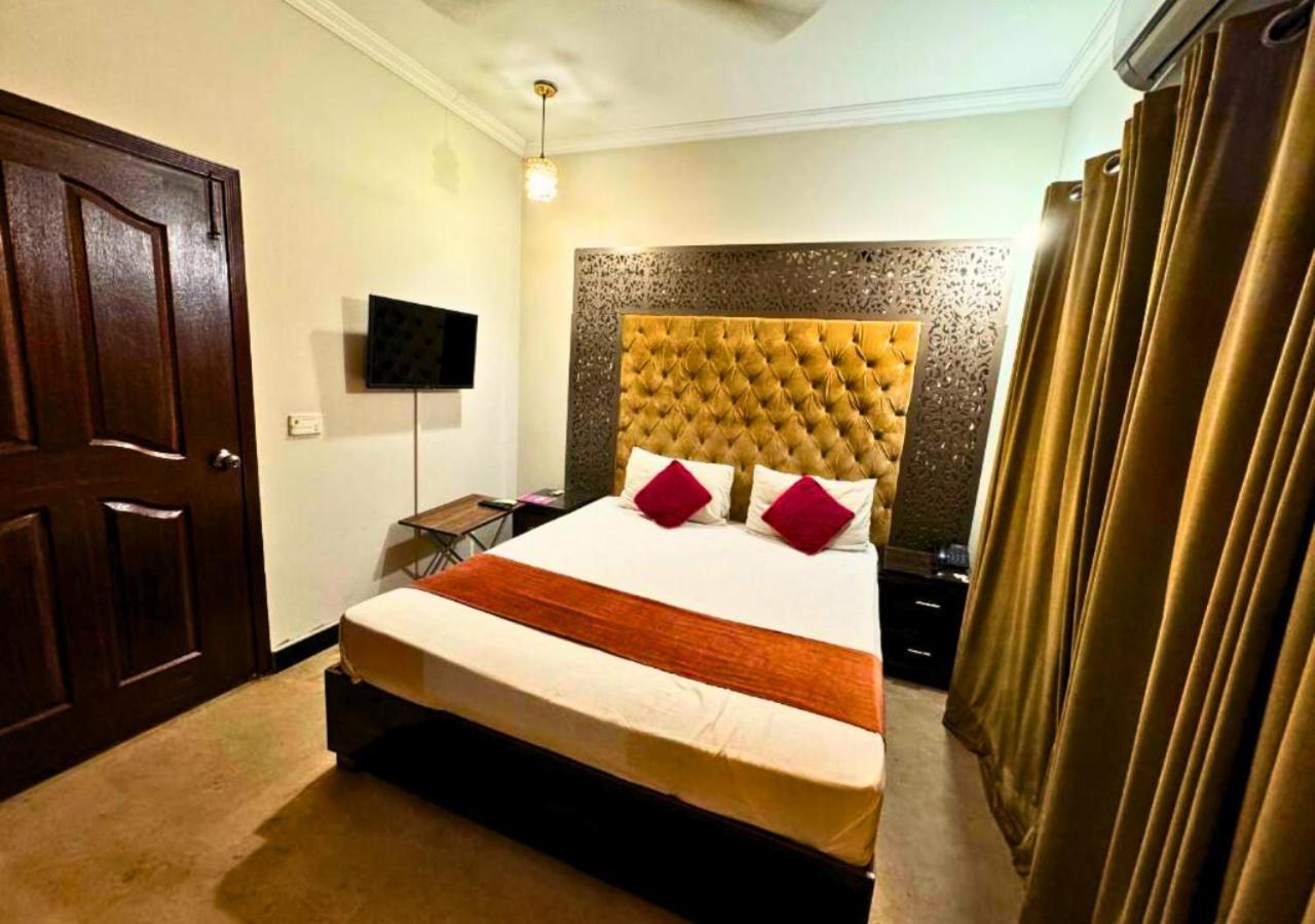 Doves Inn Hotel Kalma Chowk Лахор Екстериор снимка