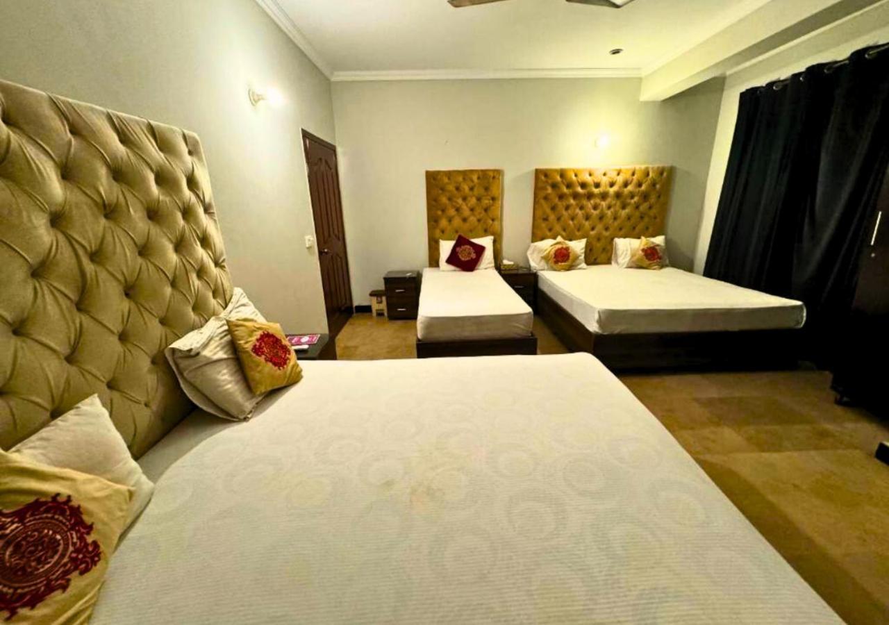 Doves Inn Hotel Kalma Chowk Лахор Екстериор снимка