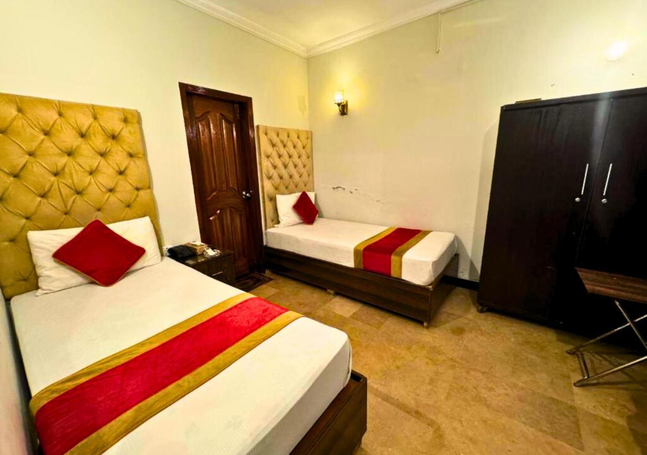 Doves Inn Hotel Kalma Chowk Лахор Екстериор снимка
