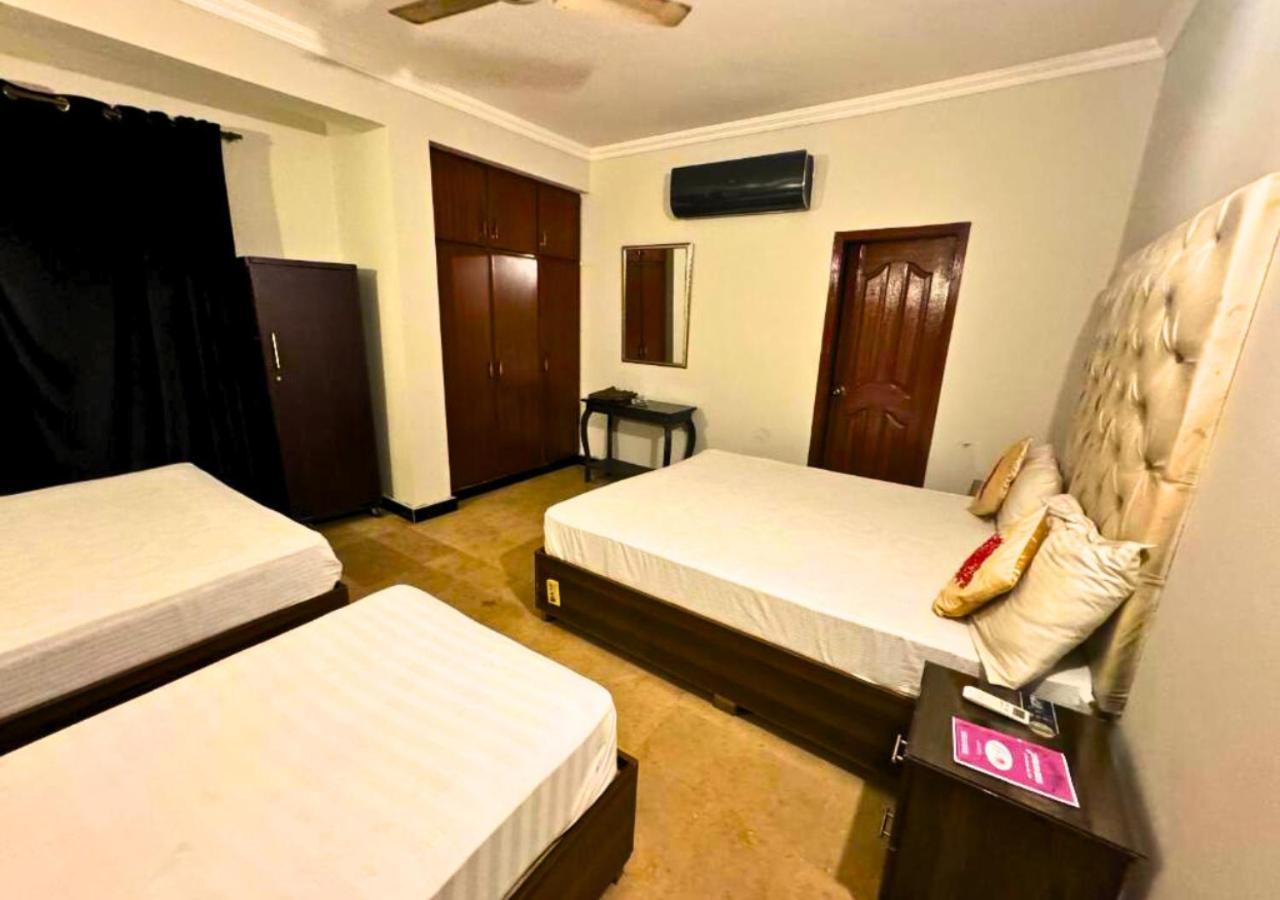 Doves Inn Hotel Kalma Chowk Лахор Екстериор снимка